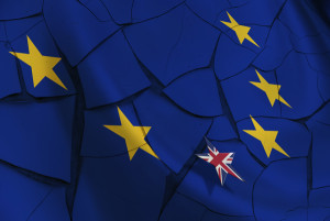 Brexit : Flag of EU and 12 gold (yellow) stars with a small star flag of UK rise above the blue background. An uncertainty when UK prime minister renegotiate Britain's relationship within the EU.