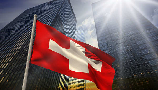 Swiss franc slides after SNB lowers rates